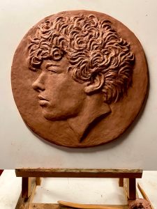 Relief portrait in the clay